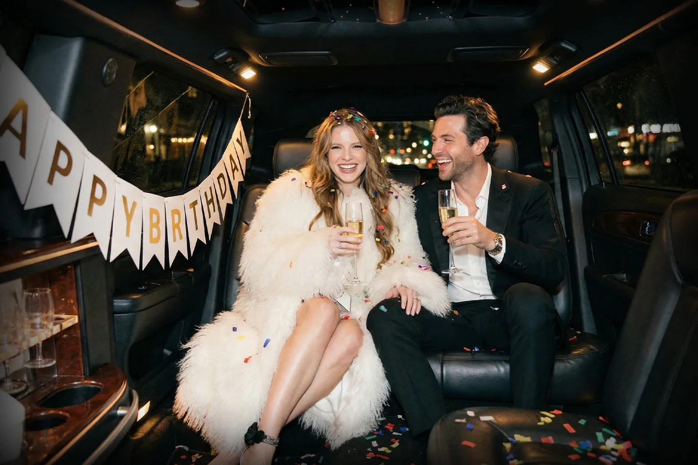Stretch limousine decorated for birthday party with professional chauffeur