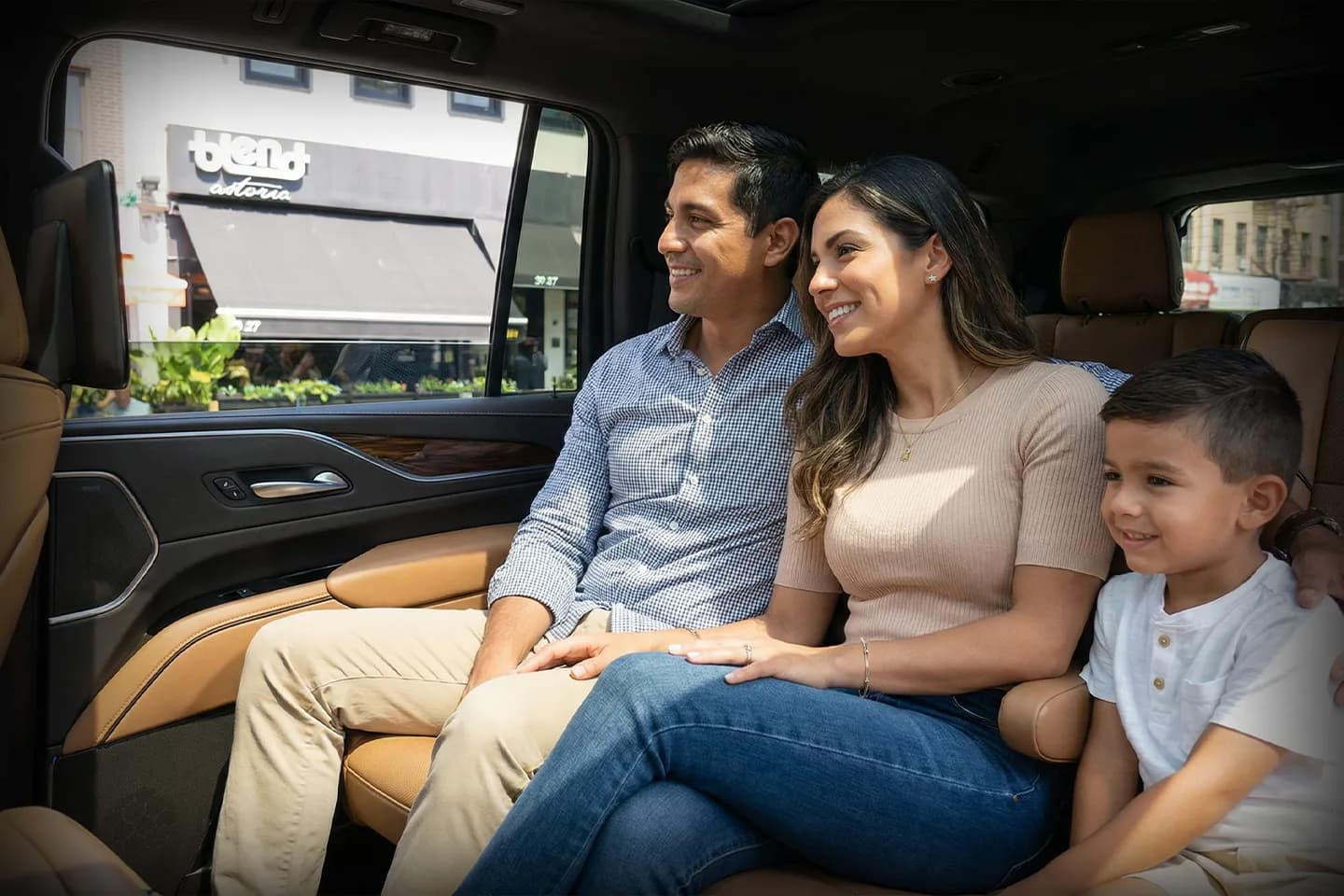Private chauffeur vehicle driving through Queens, NY