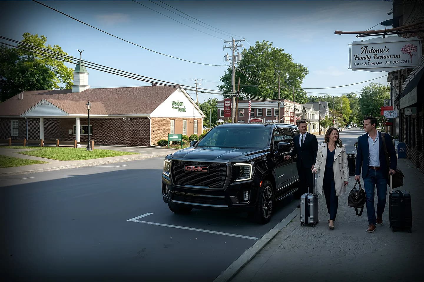 Professional chauffeur assisting passenger into luxury vehicle in Montgomery NY