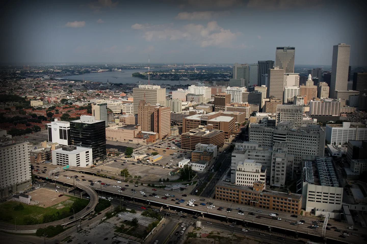 Orleans NY Chauffeur Service vehicle driving through local streets at sunset