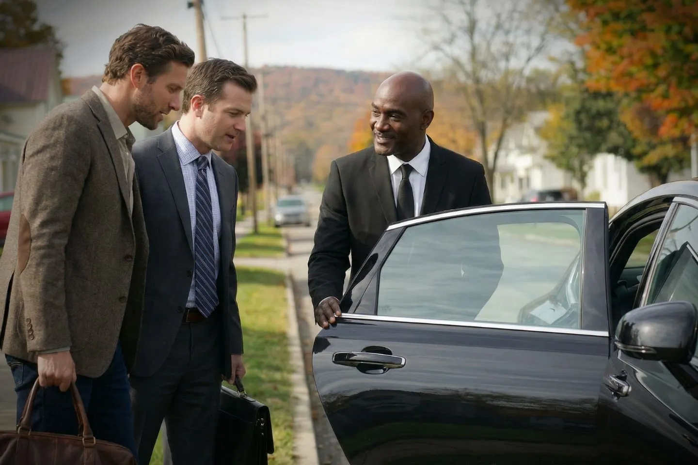 Luxury sedan parked in Tompkins NY showing Tompkins, NY Chauffeur Service for airport transfers and corporate travel