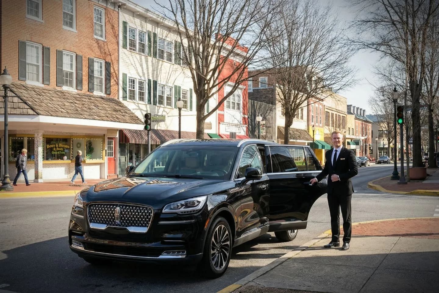 Executive riding in Delaware, DE Car Service luxury vehicle with clean interior and premium seating