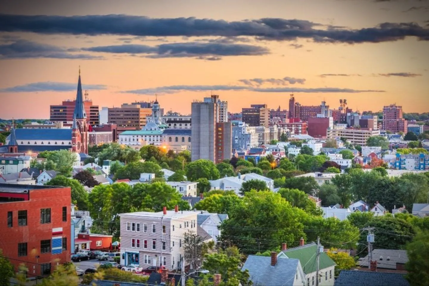 Airport transfer scene showing Maine, ME Car Service driver handling luggage for traveler