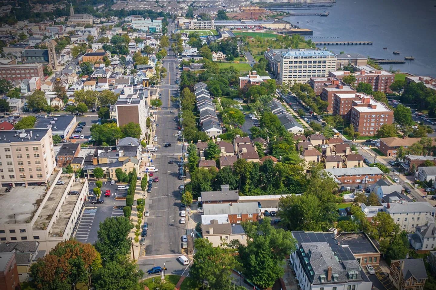 Professional chauffeur driving executive client in Middlesex NJ car service through city streets