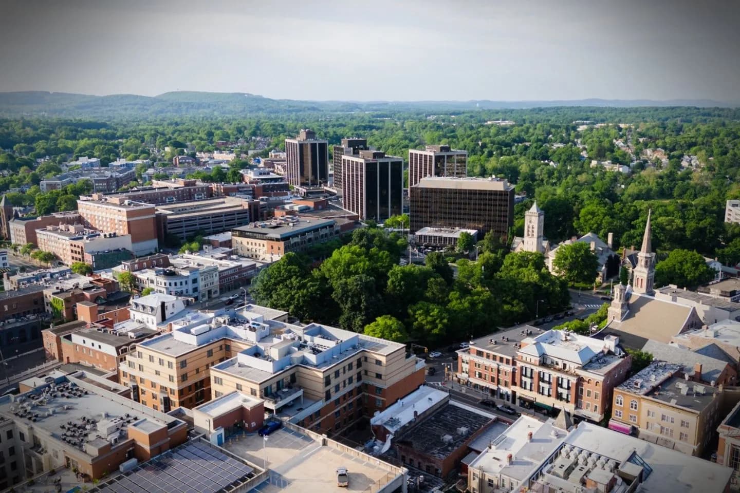Morris NJ Car Service airport pickup with luxury vehicle waiting curbside at terminal