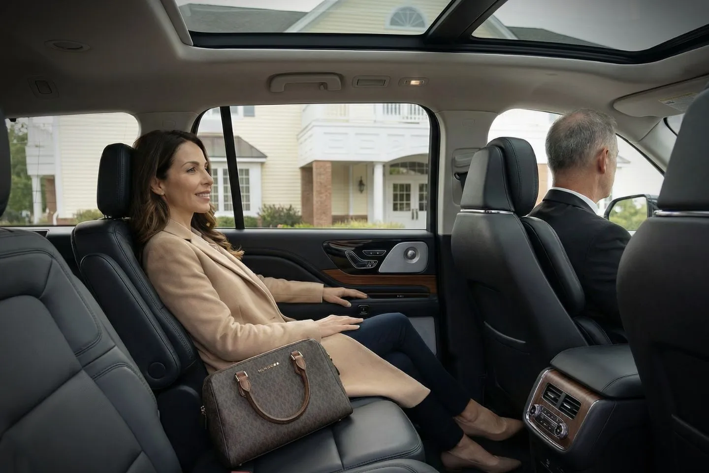 Airport pickup by Warren NJ car service chauffeur holding sign near terminal entrance