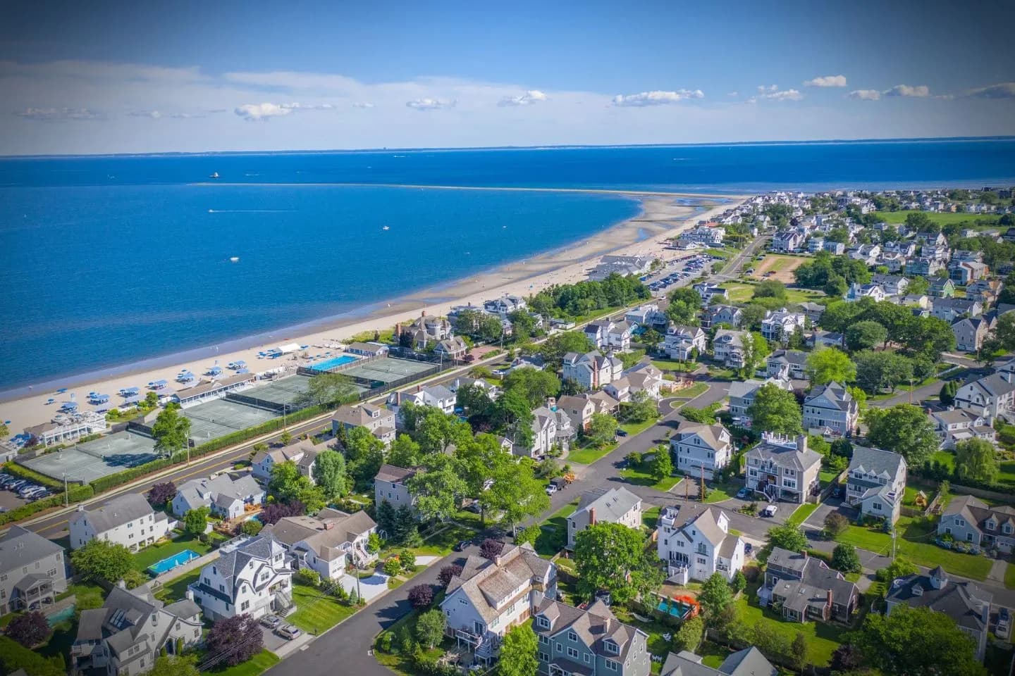 Professional chauffeur driving luxury vehicle for Fairfield CT car service clients