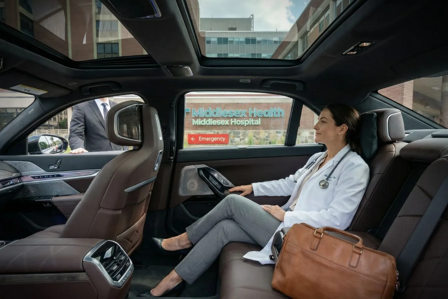 Executive black car from Middlesex, CT Car Service providing corporate transportation in downtown area