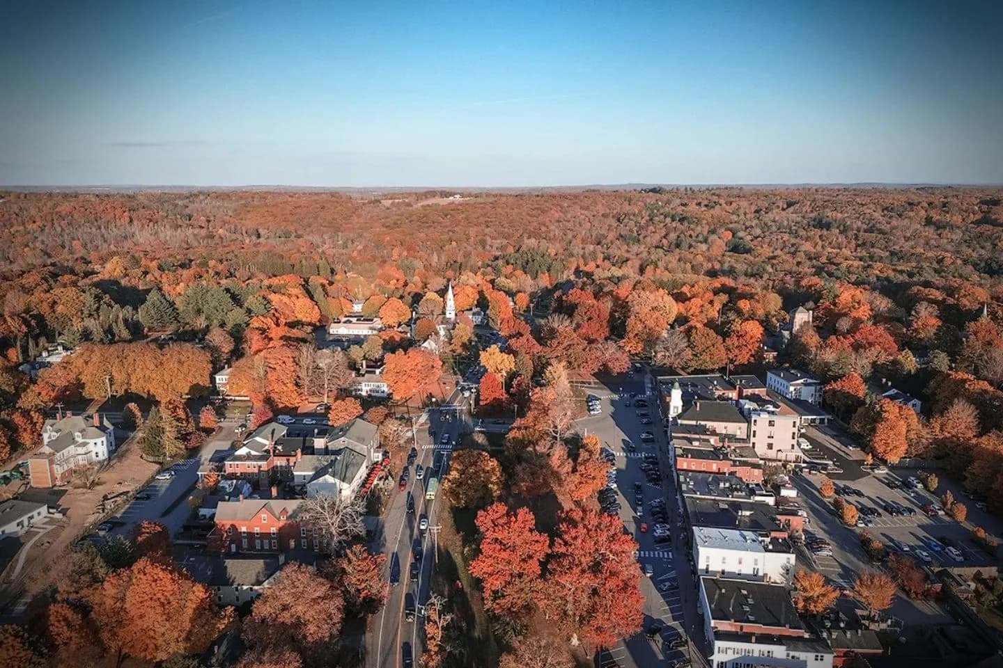 Middlesex, CT Car Service chauffeur opening door of premium vehicle for business traveler