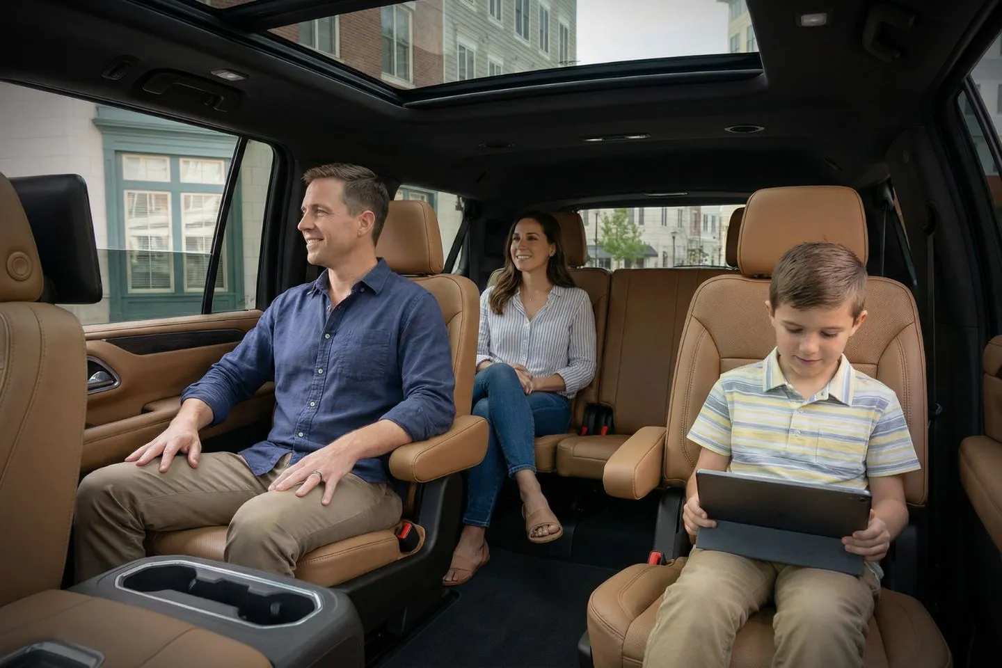 Professional driver in uniform providing Tolland CT car service for business traveler