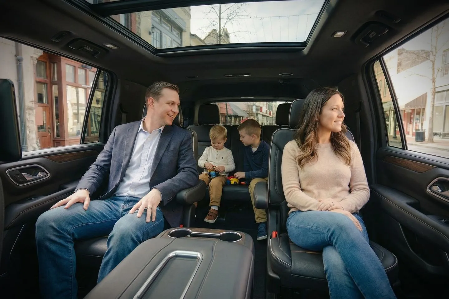 Chauffeur in uniform driving luxury vehicle during Alabama, AL Chauffeur Service corporate transfer