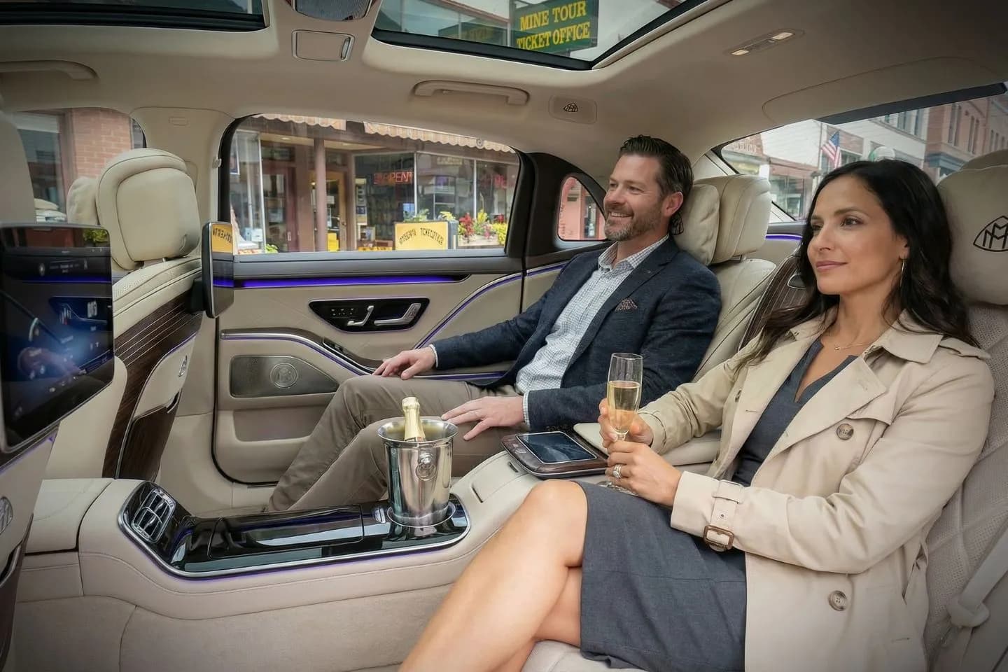 Chauffeur opening door for client using Idaho, ID Chauffeur Service in downtown area