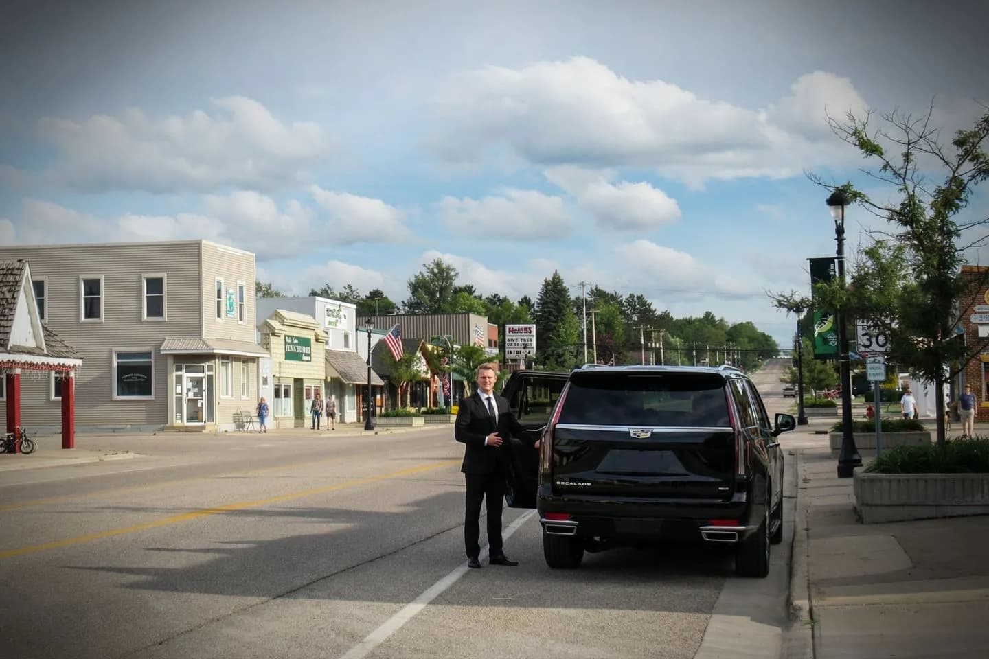 Wedding transportation by Michigan, MI Chauffeur Service featuring luxury car and professional chauffeur