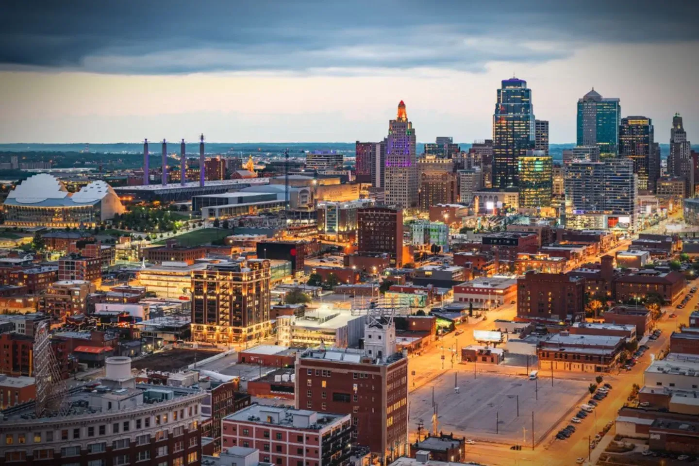 Night city ride with Missouri, MO Chauffeur Service luxury car and chauffeur driving through downtown