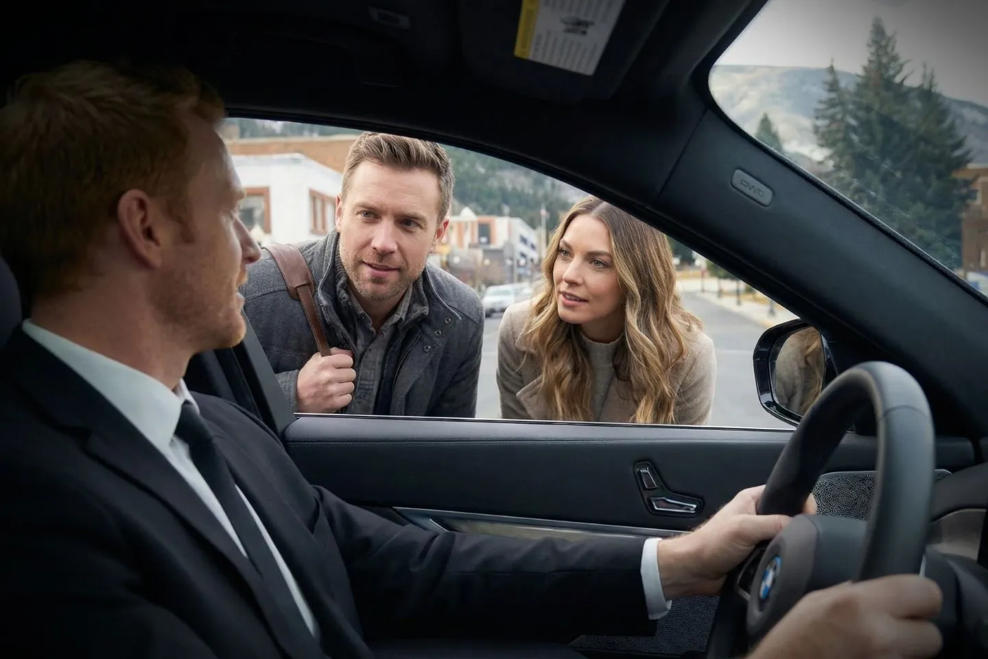 Professional chauffeur opening car door for client in Montana, MT Chauffeur Service