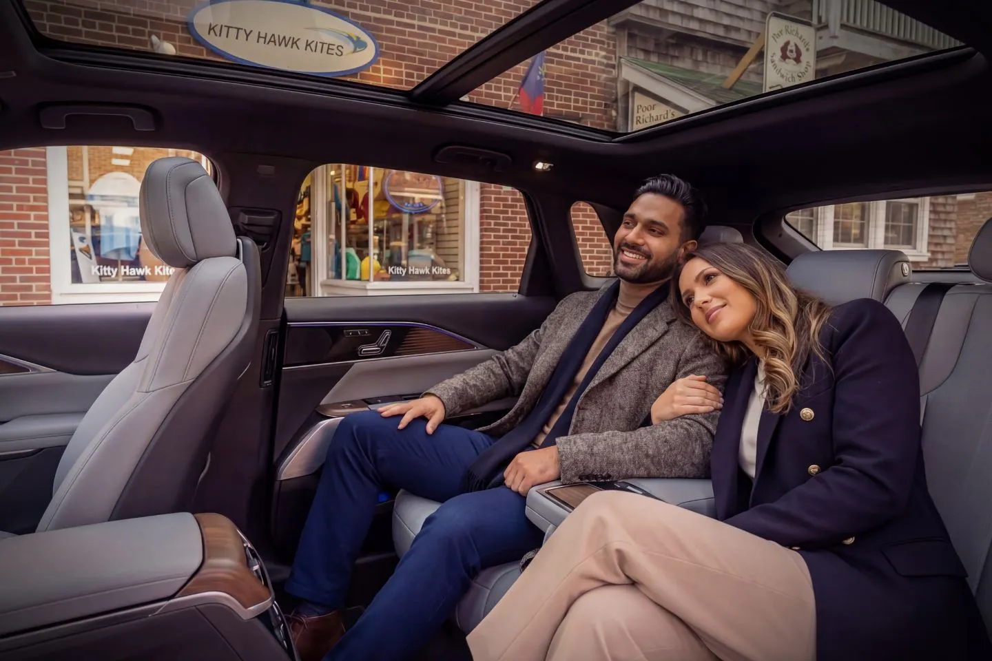 Airport pickup scene with luxury vehicle from North Carolina, NC Chauffeur Service and uniformed driver