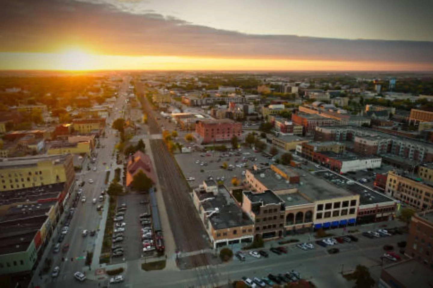 Nighttime city ride with North Dakota ND chauffeur service showcasing luxury vehicle interior and professional driver