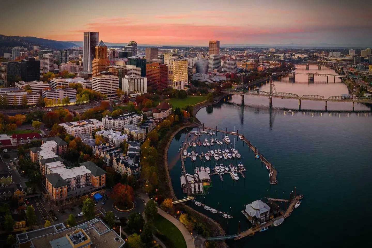 Business traveler entering luxury vehicle from Oregon Chauffeur Service outside office building