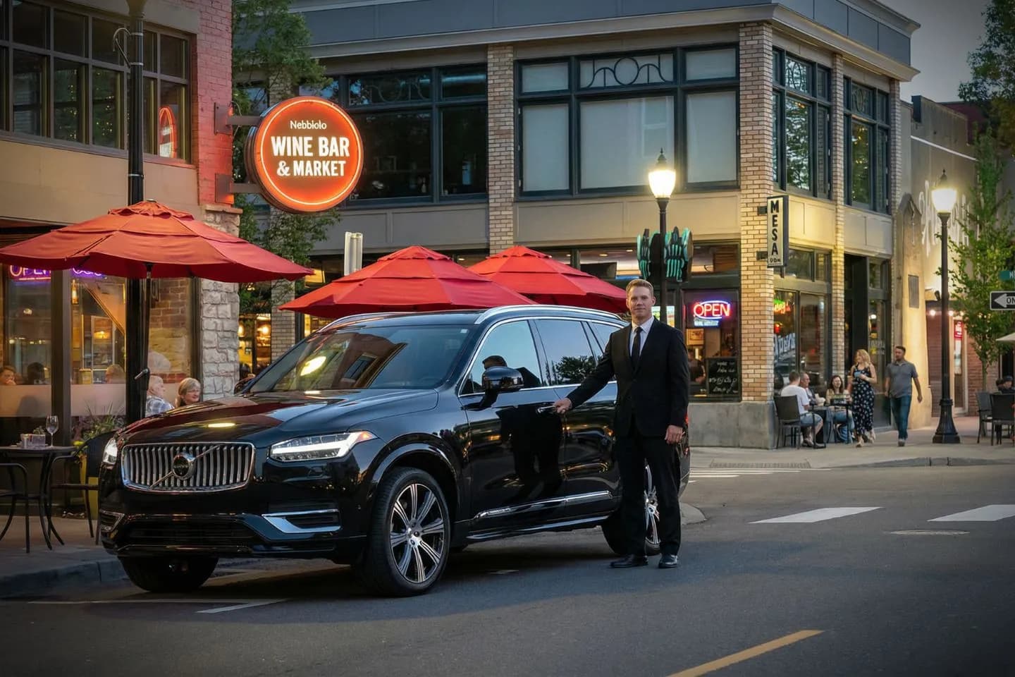 Airport pickup scene with Oregon, OR Chauffeur Service driver assisting passenger with luggage