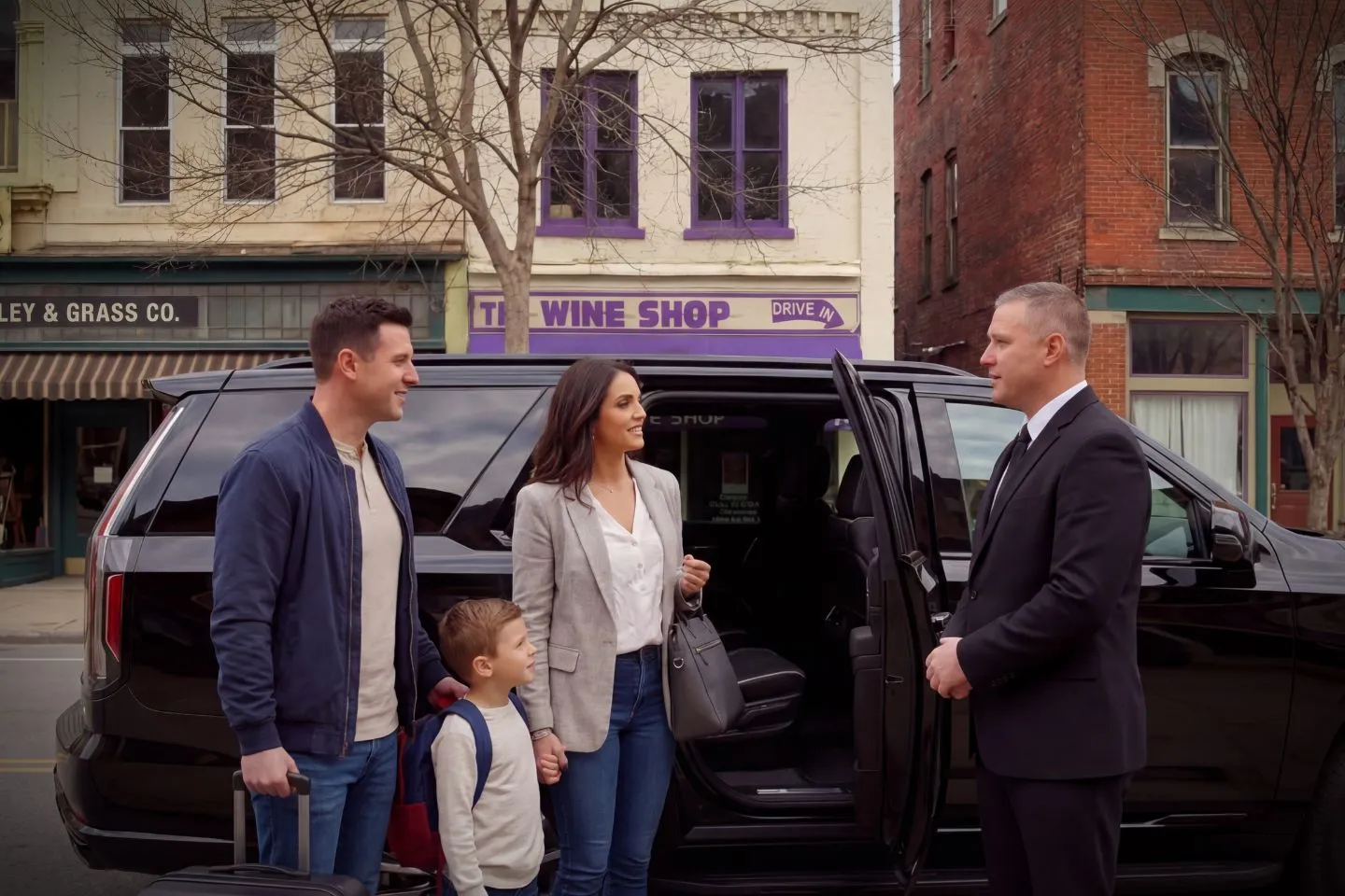 Premium sedan from Pennsylvania, PA Chauffeur Service transporting executive client through downtown Pittsburgh streets