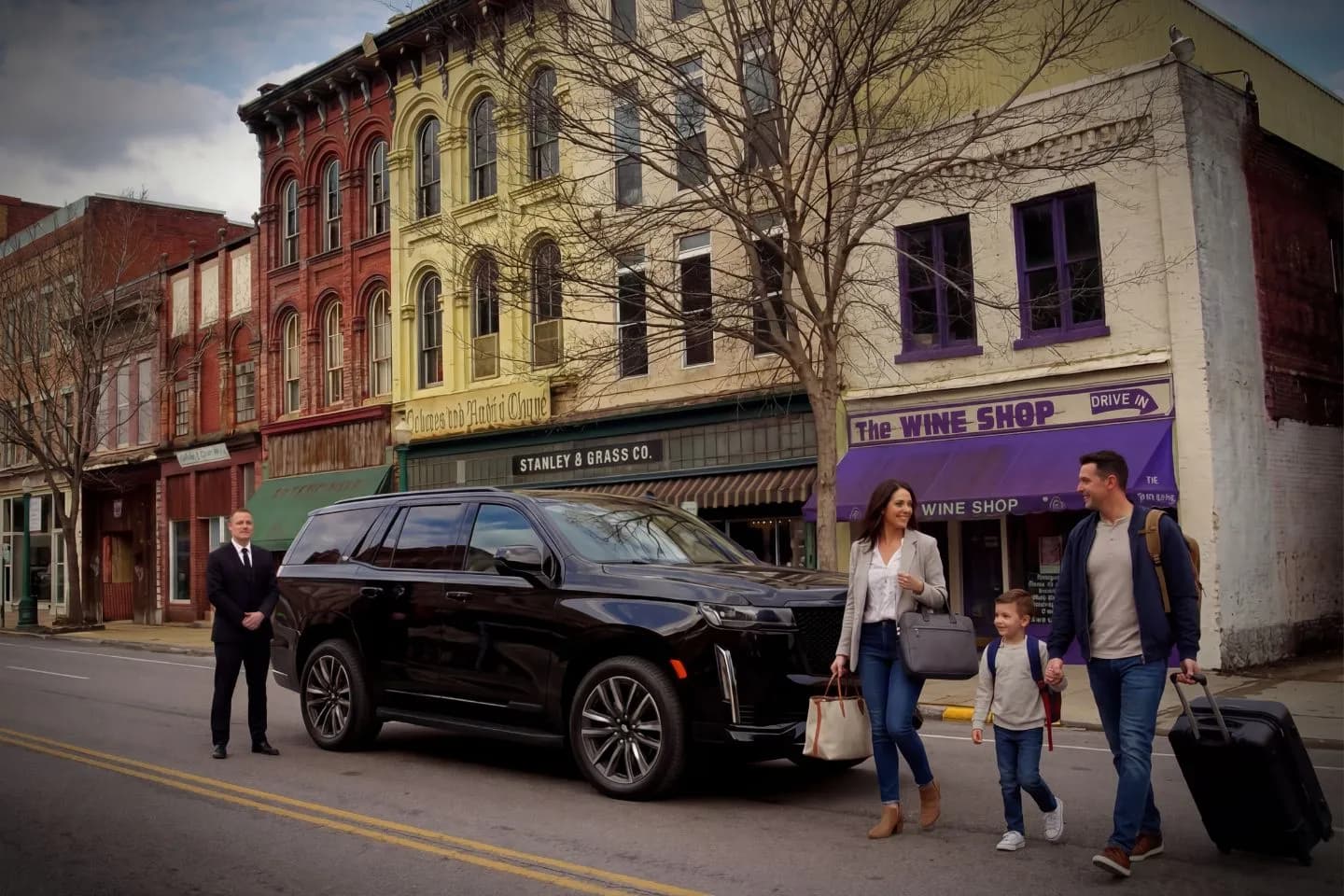 Pennsylvania, PA Chauffeur Service luxury black car waiting at Philadelphia airport terminal pickup curb