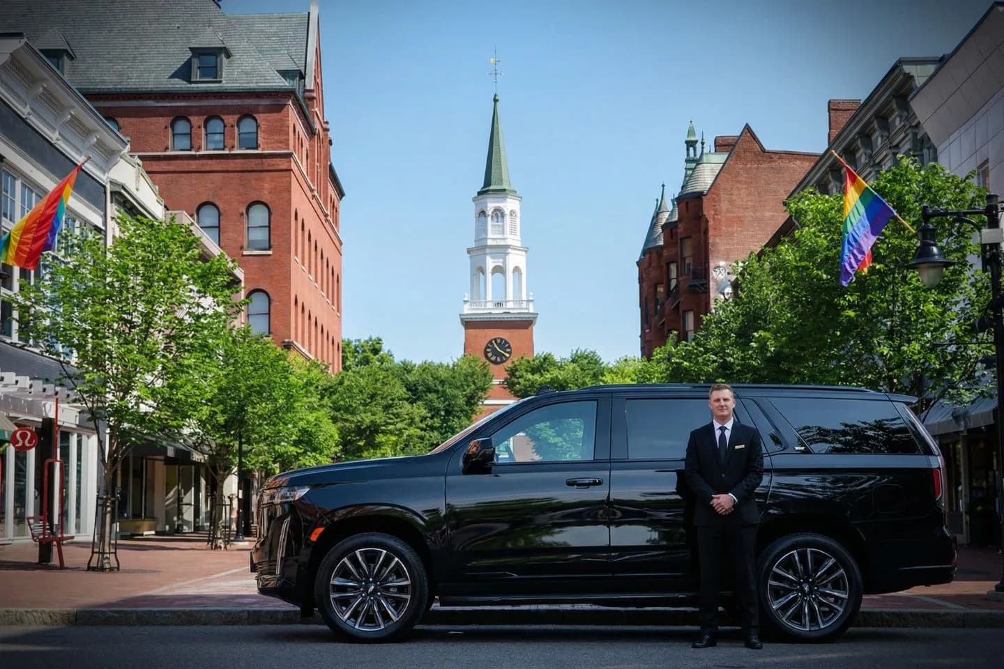 Vermont, VT Chauffeur Service luxury black sedan parked outside upscale hotel entrance