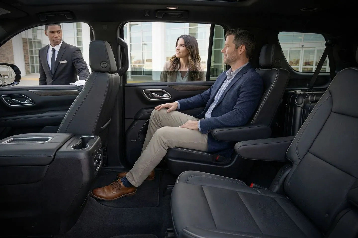 Alaska AK chauffeur service sedan driving through scenic mountain road in winter