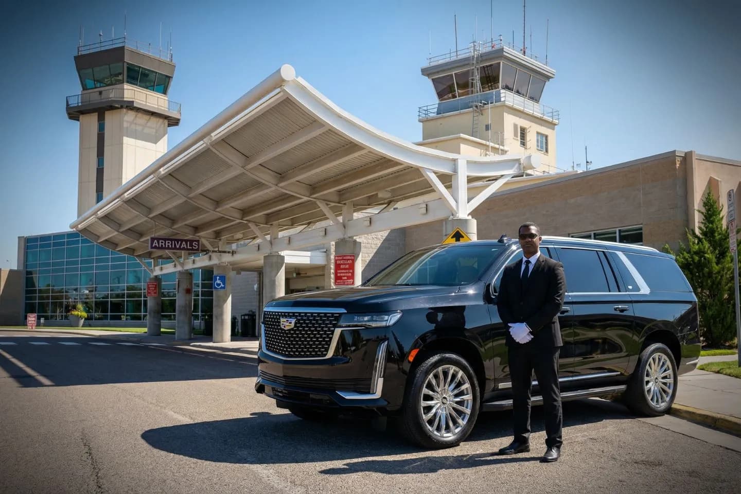 Airport pickup scene featuring Idaho, ID Car Service driver greeting traveler with luggage assistance