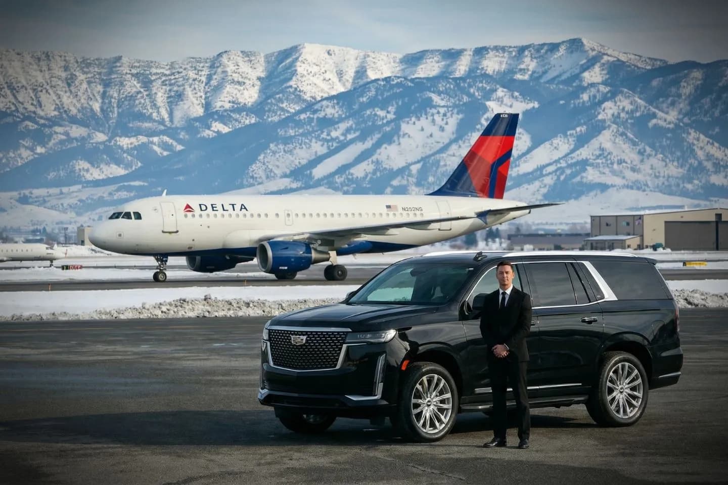 airport pickup Montana MT Car Service chauffeur holding name sign inside arrivals hall