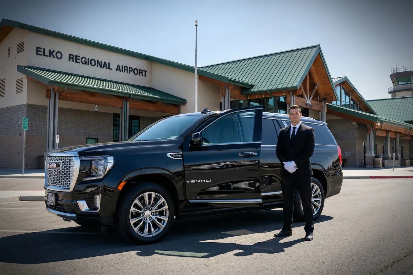 Professional driver in uniform providing New Hampshire, NH Car Service for airport transfer