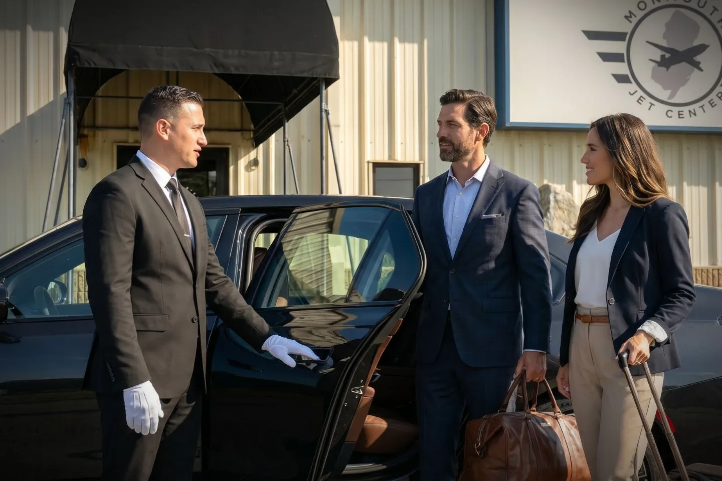 Professional chauffeur with BLM Car Service at private jet terminal Monmouth NJ