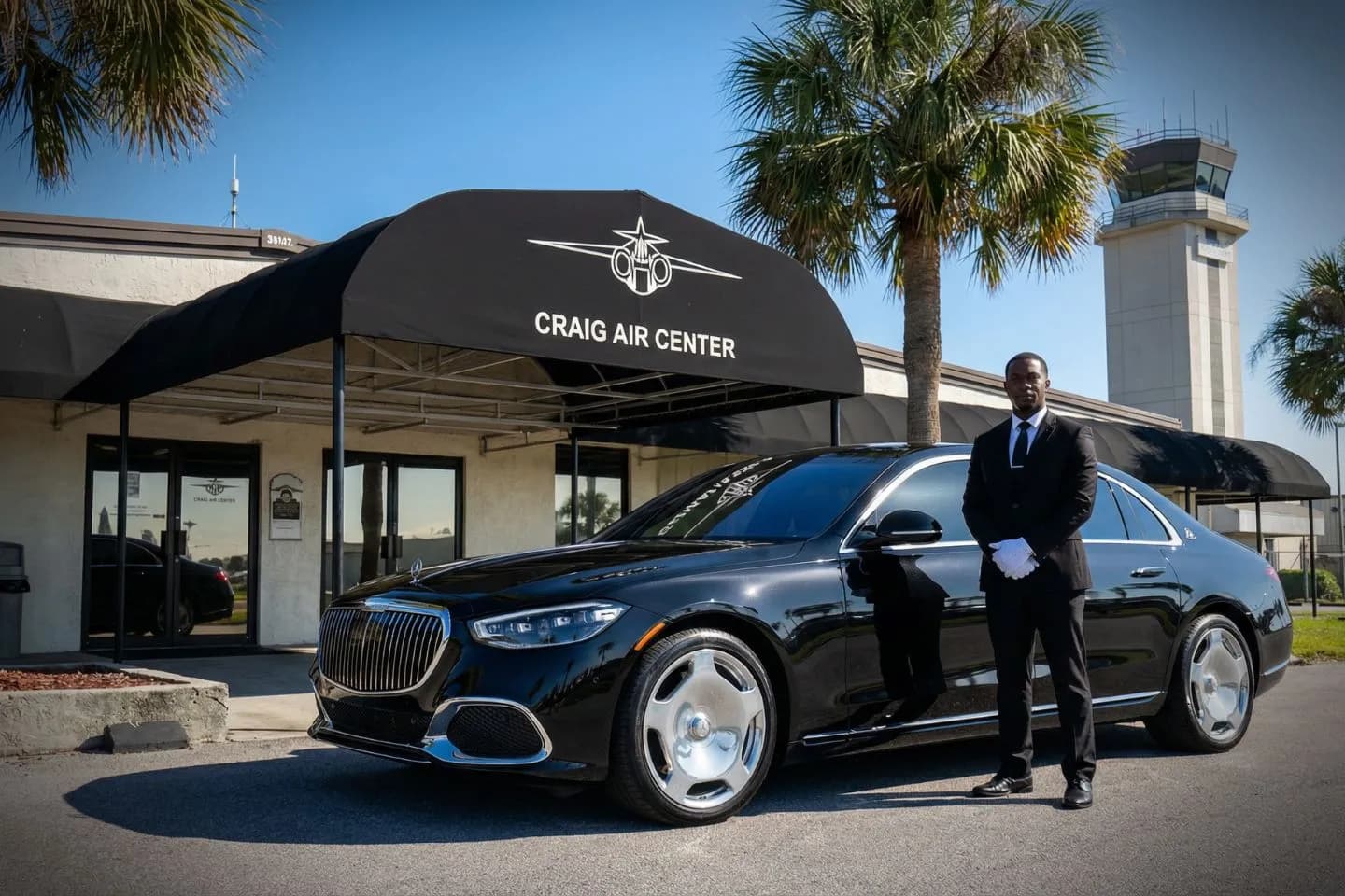 Jacksonville Executive at Craig (CRG) Car Service luxury sedan at airport terminal Florida FL