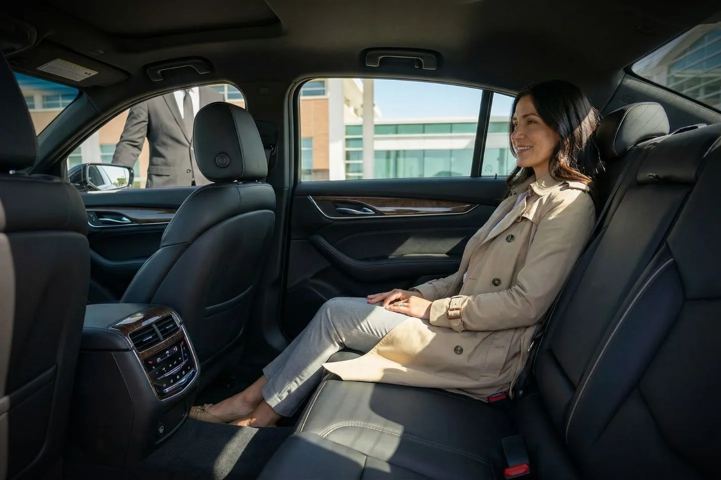 22.	Professional chauffeur greeting client at Peoria Airport arrivals area