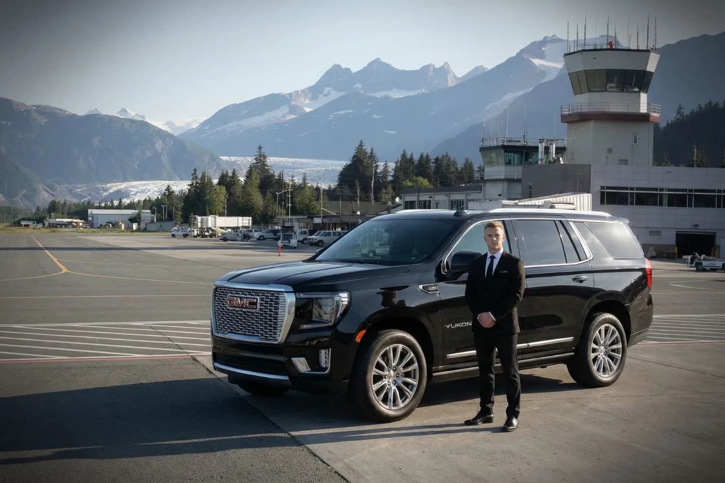 Black luxury sedan parked at Ketchikan International Airport on Gravina Island