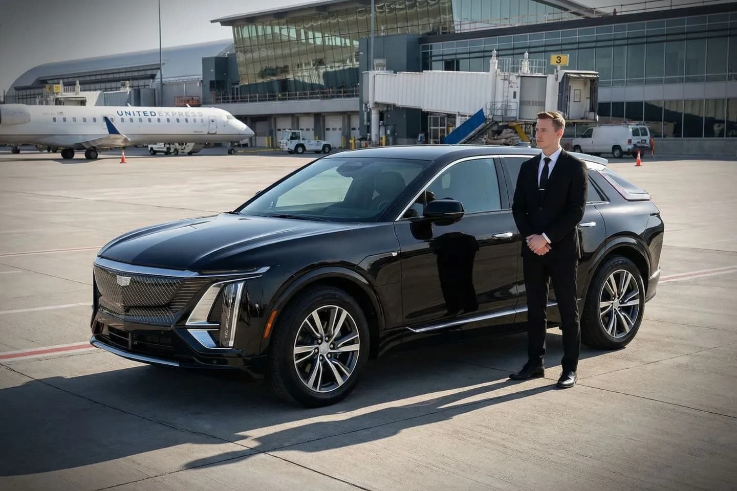 Black Cadillac Escalade chauffeured car at Fort Wayne airport for ride to Purdue Fort Wayne campus and the Embassy Theatre