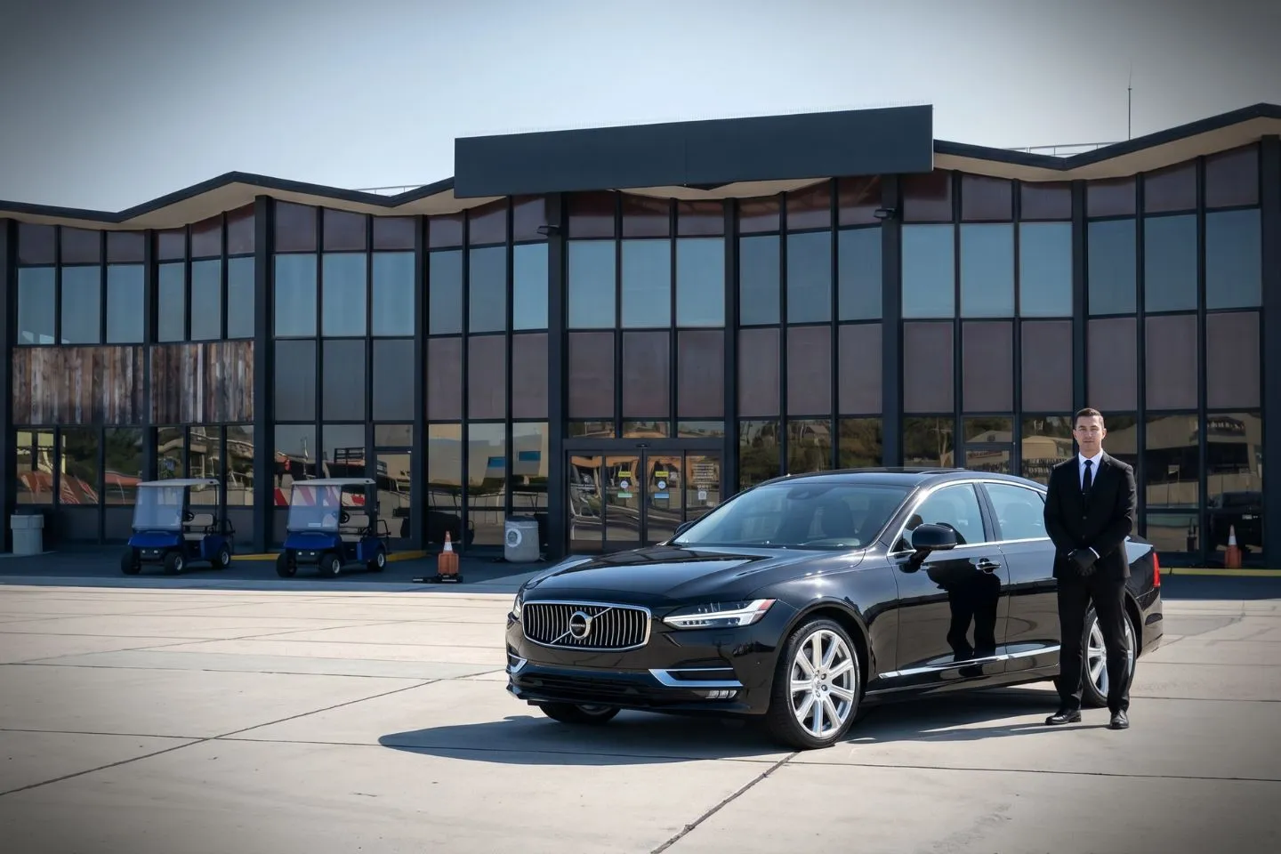 Union Limousine chauffeur greeting SpaceX Hawthorne executive at HHR Jack Northrop Field Hawthorne airport FBO