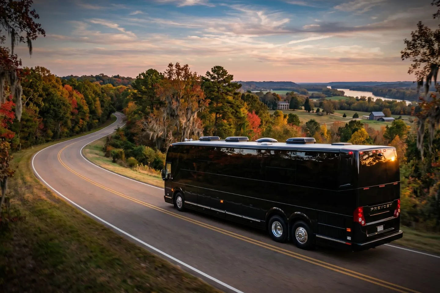Black charter bus waiting outside a Jackson hotel for a Mississippi corporate group