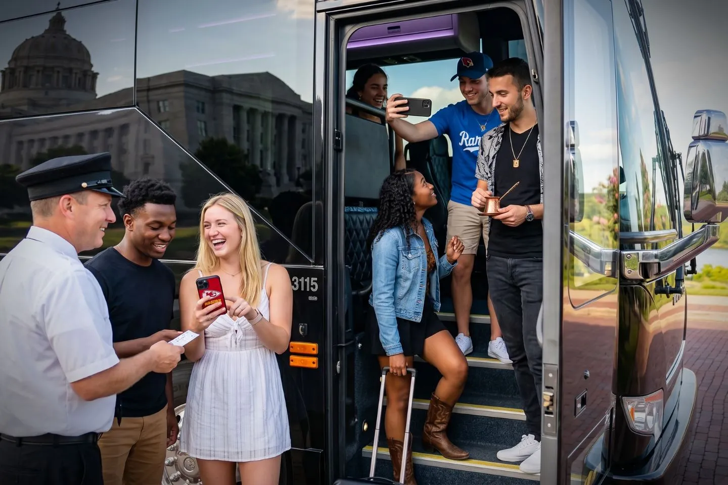 Travelers loading luggage into a modern charter bus for a Missouri group trip