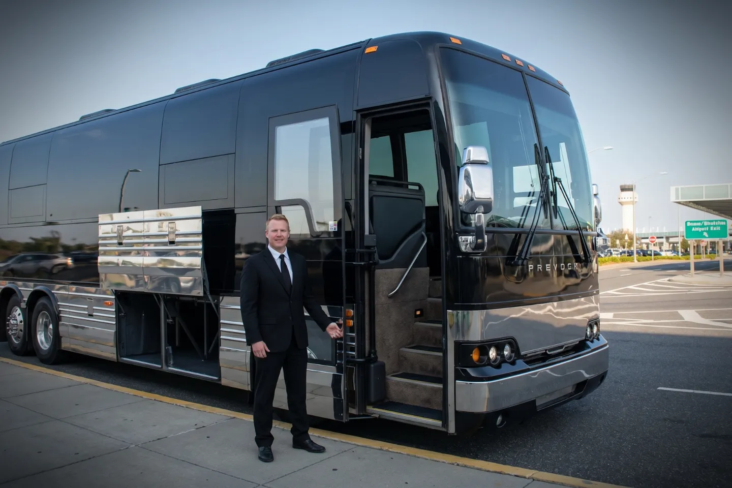 Coach interior with overhead bins ready for a Long Island airport transfer