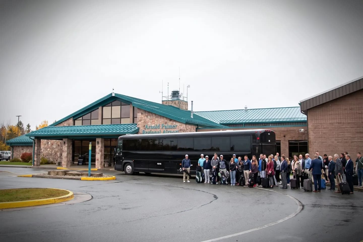 Motor coach parked at the Arnold Palmer Regional Airport LBE terminal in Latrobe