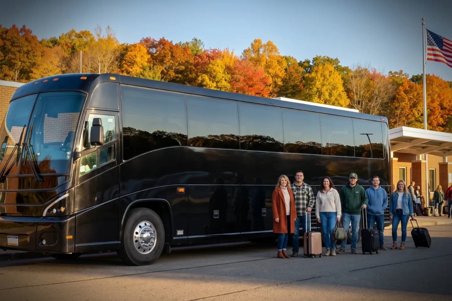 Group travelers gathered beside a charter bus at Bradford Regional Airport