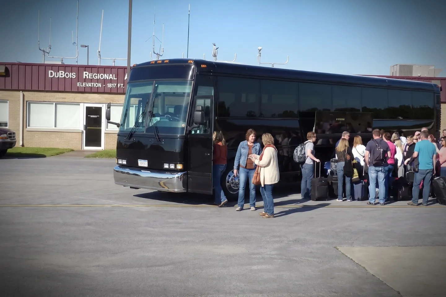 Charter bus rental parked at the DuBois Regional Airport DUJ terminal in Reynoldsville