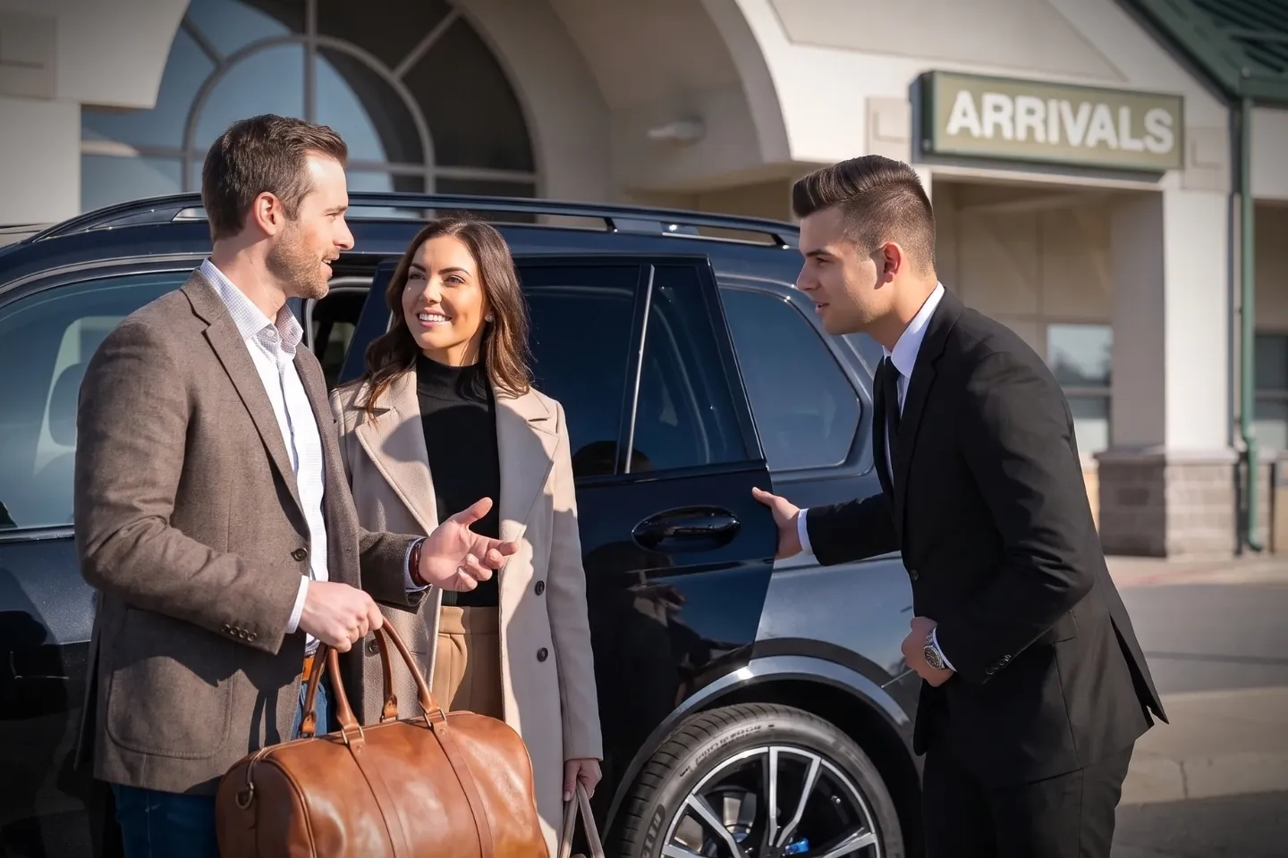 Passenger stepping into a chauffeured car at JST Airport arrivals