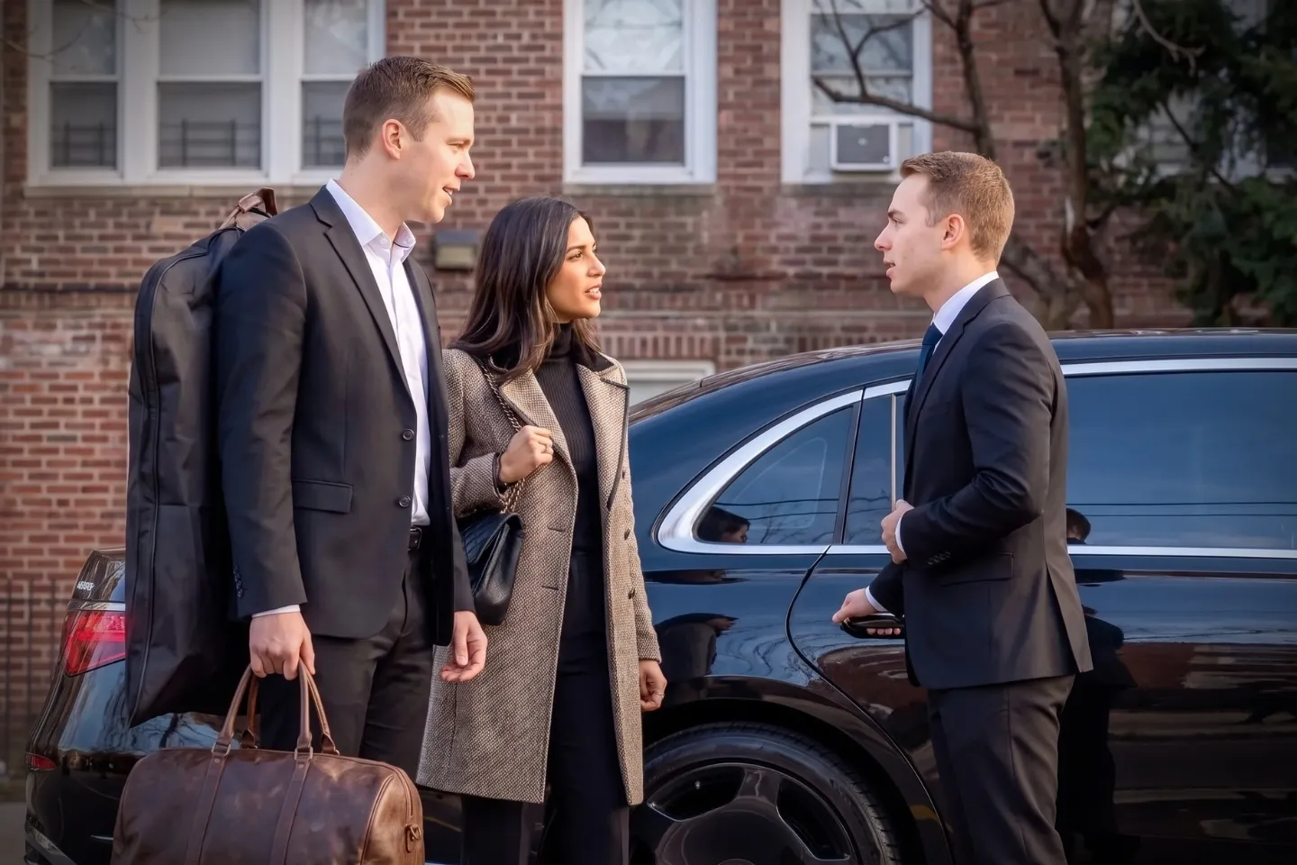 Sleek town car waiting at a curb in Cypress Hills, Brooklyn, New York