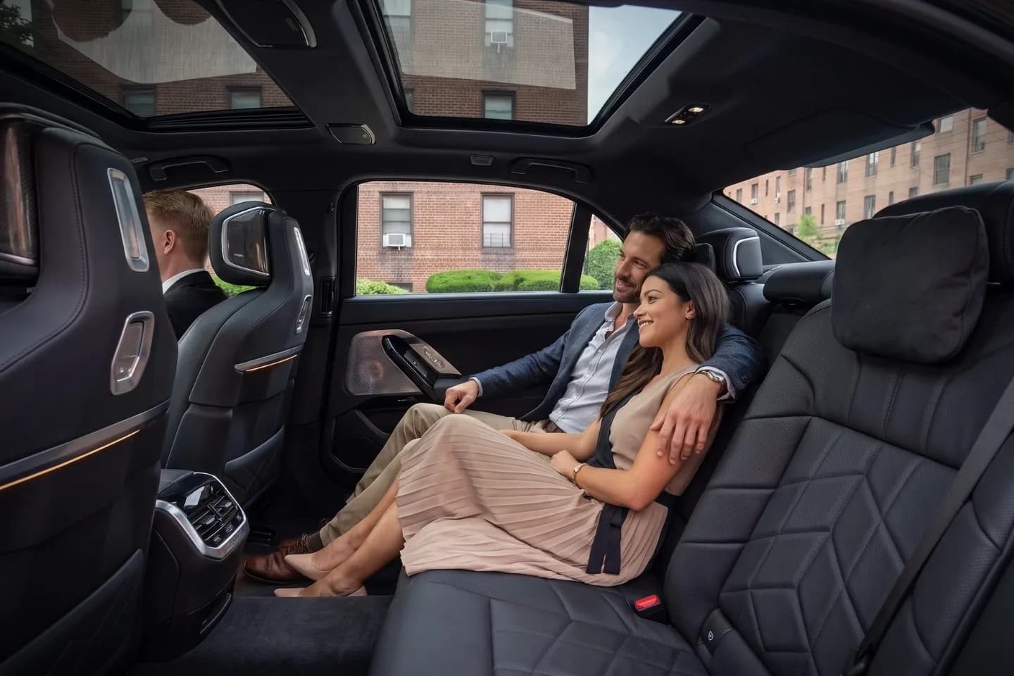 Elegant black car service vehicle photographed on a Eastchester, Bronx avenue