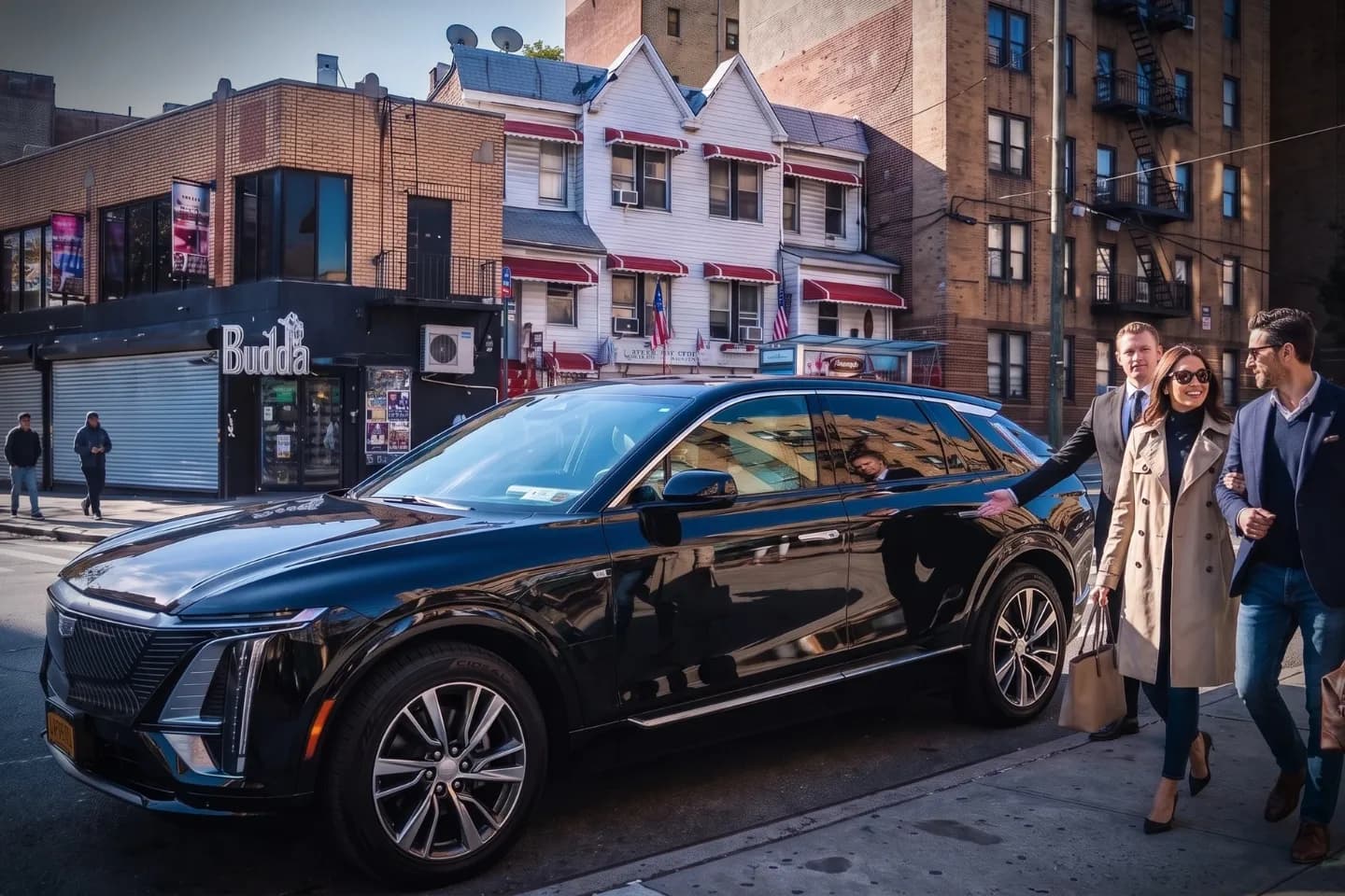 Modern luxury SUV parked outside a Highbridge, Bronx train station