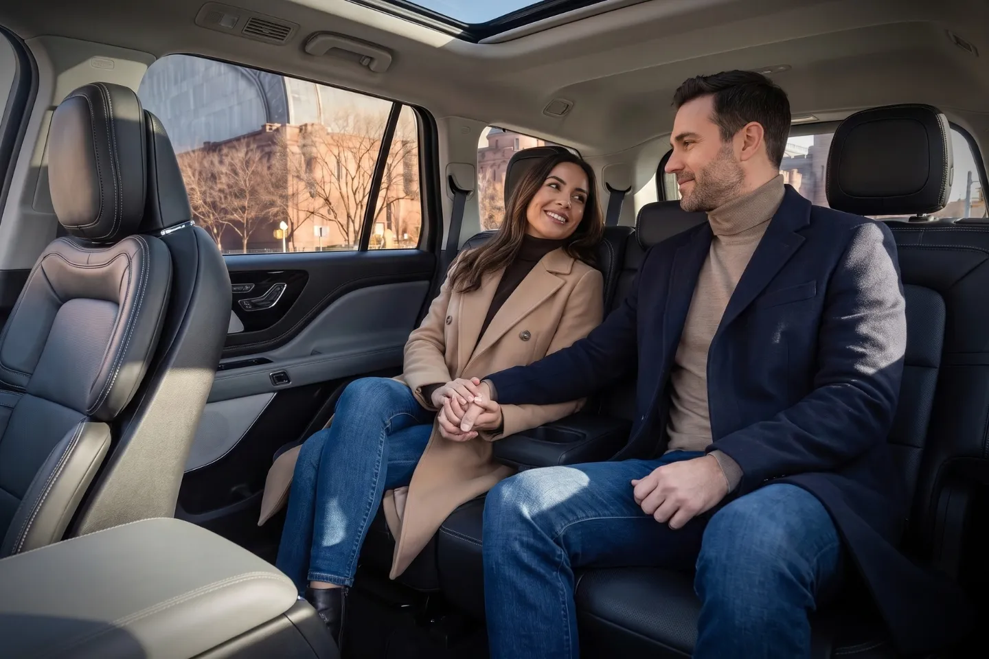 Family climbing into a spacious SUV for Kingsbridge, Bronx transportation