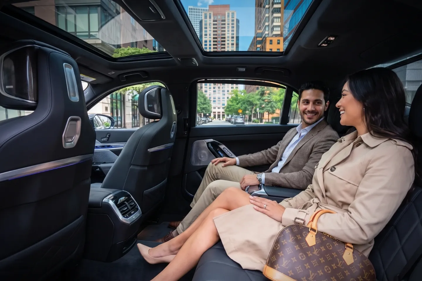 Private driver greeting a business traveler in the valet drop-off area in Battery Park City, NY