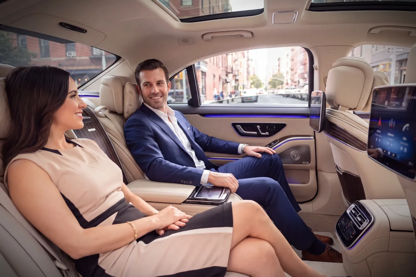 Professional chauffeur greeting a business traveler in Bowery, NY
