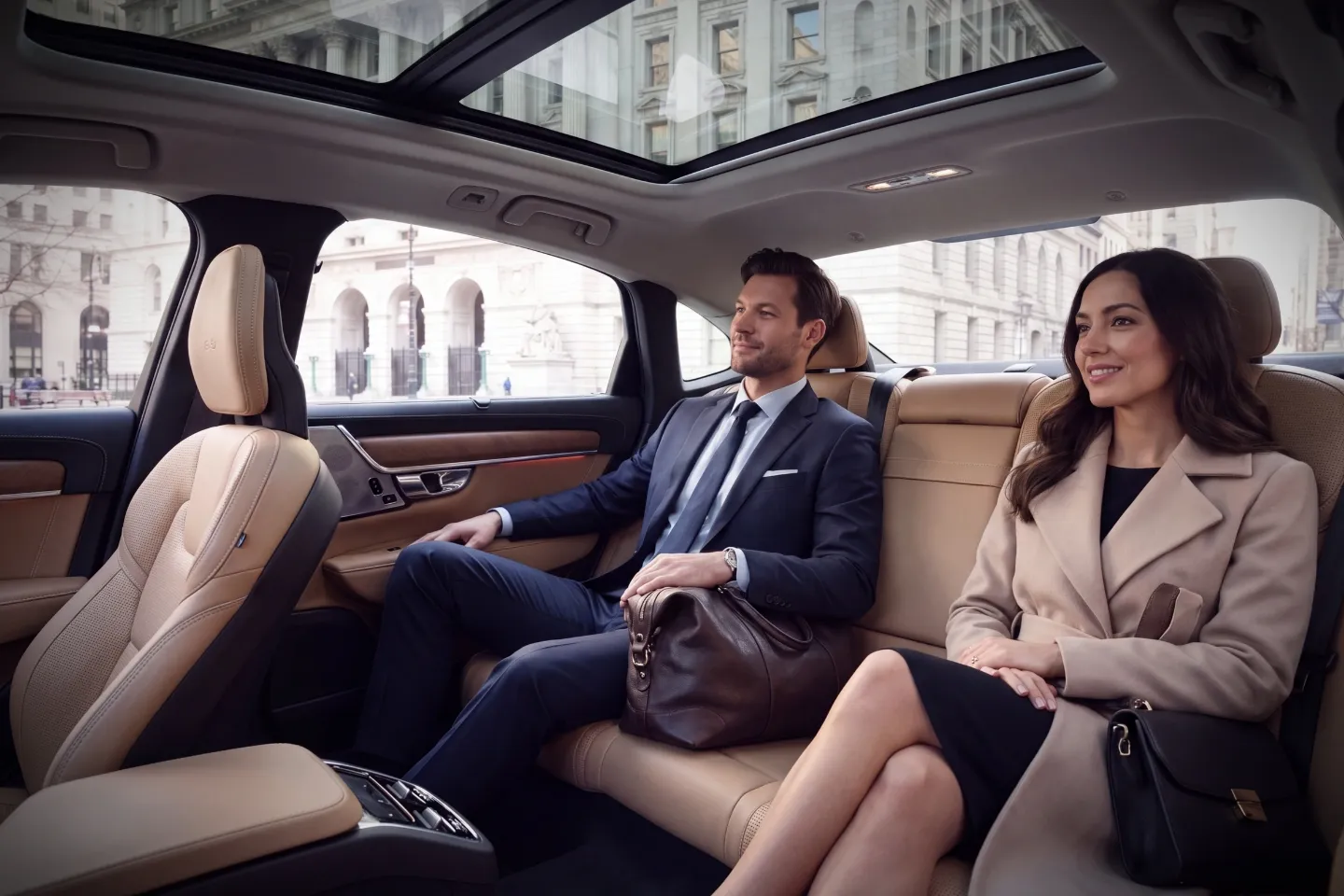Professional chauffeur greeting a business traveler in Civic Center, NY